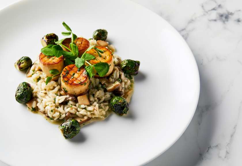 king oyster mushroom "scallops" with wild mushroom risotto and roasted Brussels sprouts
